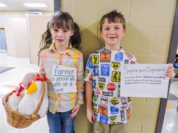 Students and teachers dressing up for a vocabulary parade. 